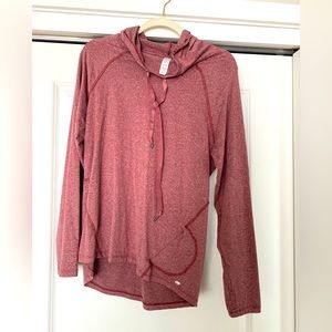Two woman’s medium pullovers workout material